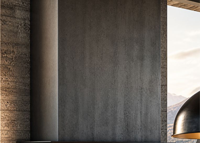 Nahaufnahme der puristischen Oberflächengestaltung in Beton-Optik, die die moderne Designsprache der Stylefire III Serie unterstreicht.