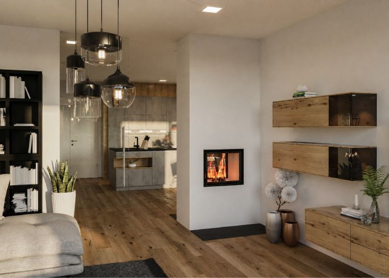 Eine schlichte Kaminanlage mit Tunneleinsatz und Spachtelputz-Oberfläche, die als moderner Raumtrenner zwischen Wohn- und Essbereich fungiert.