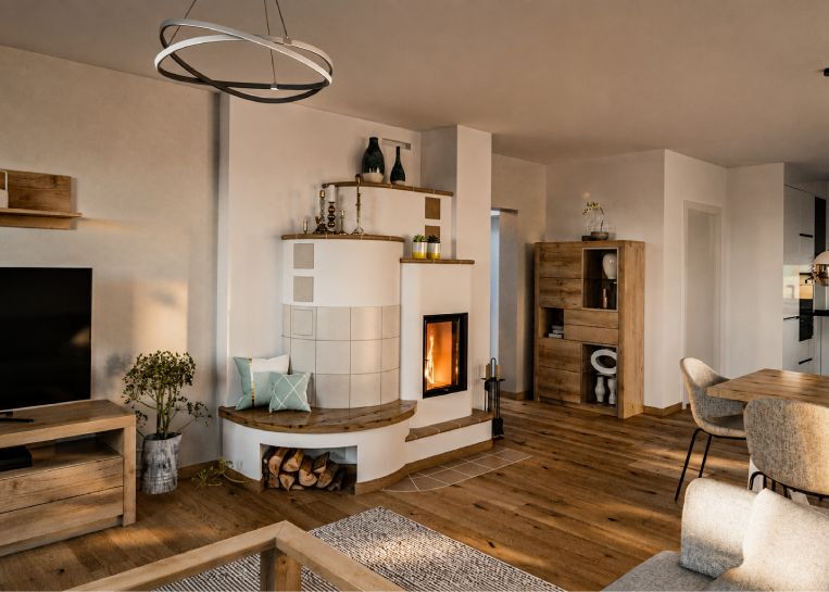 Perspektivische Ansicht des Kombiofens im offenen Wohn-Esszimmer, der durch sein individuelles Design Eleganz und Wärme ausstrahlt.